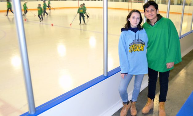 Exchange students try their hands at broomball