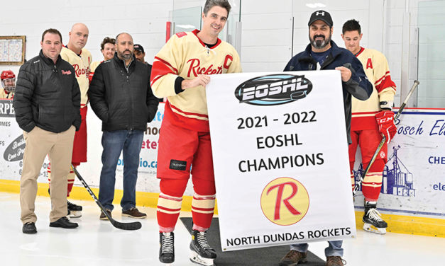 North Dundas Rockets cap banner presentation with a win